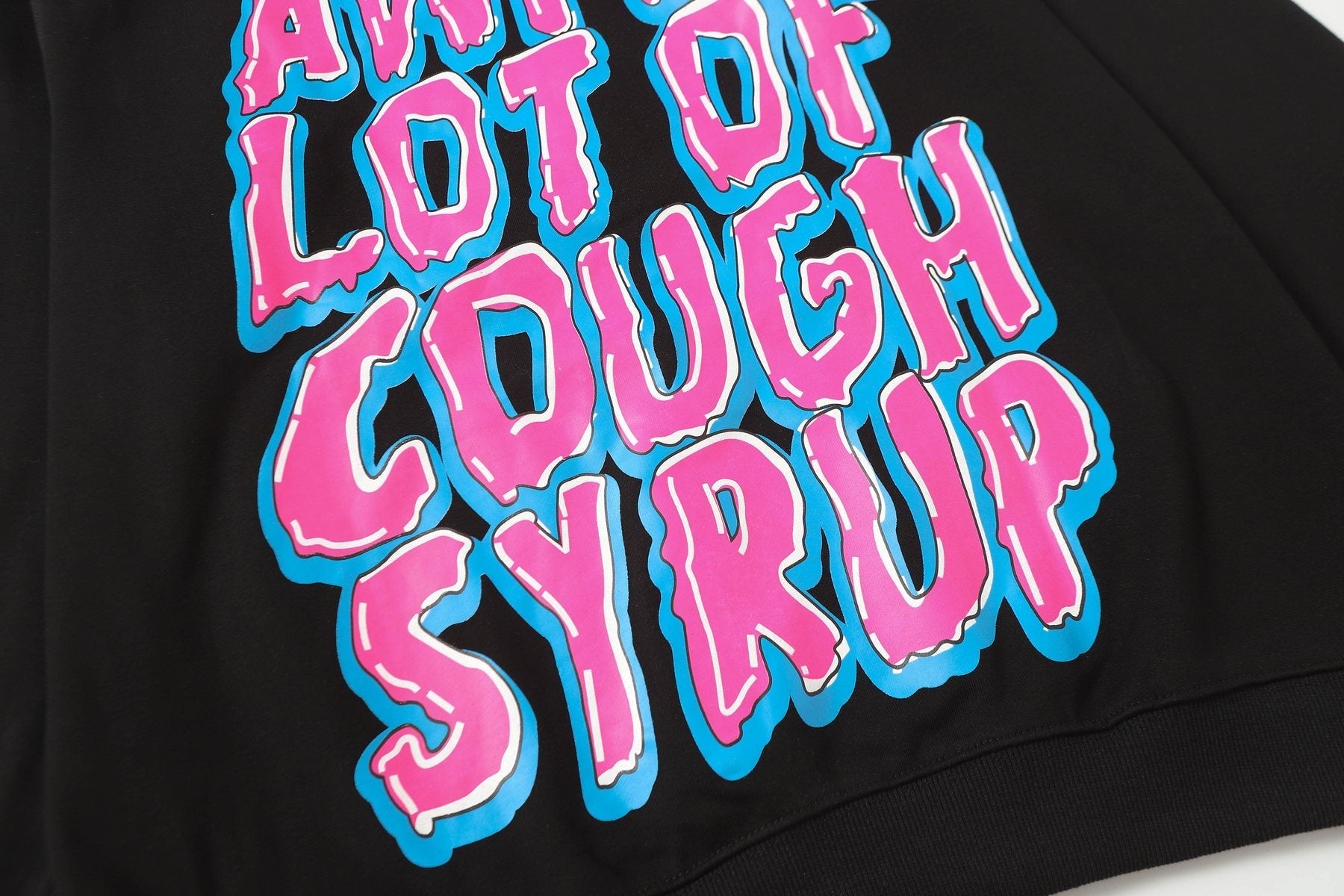 THAT'S A AWFUL LOT OF COUGH SYRUP Star Graphic Hoodie — detail